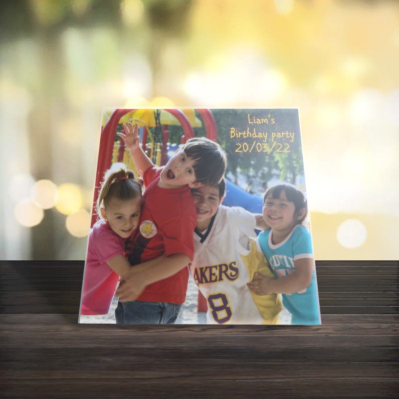 ceramic tile, personalised with a photo with kids playing and reads Liam's birthday party