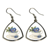 Triangle curved metal earrings with a design of a teacup and purple flowers