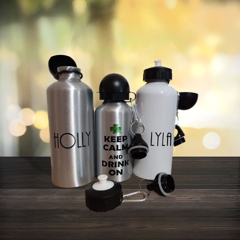 Personalised bottle silver aluminium 600ml with Holly text on one bottle, silver aluminium 400ml bottle with keep calm and drink on and white aluminium water bottle 600 ml with name Lyla, all with 2 lids