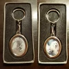 Personalised Metal Double sided oval keyring Personalised Metal Double sided oval keyring with photos of dogs