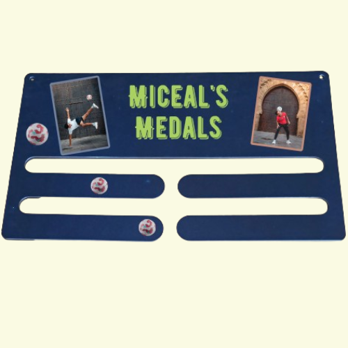 Personalised Metal Double medal holder with 2 photos of a young lad doing tricks with his football and text Miceal's Medals